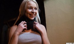 Playful blonde Karol Lilien shows off her awesome boobies