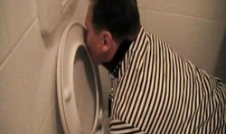 Amateur dominatrix in black boots and her sub slave