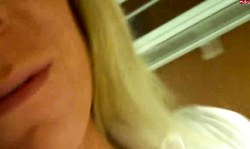 Blue-eyed amateur blonde shows off her sexy cleavage