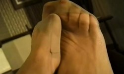 Sweet Nylon Fetish cutie shows off her accurate soles