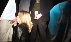 British slut in leather jacket is sucking on a dogging mission