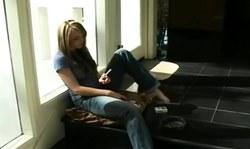 Impressive Nylon Fetish bitch smokes a cigarette and strokes her crack