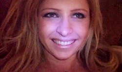 Smiling young Amateur shows off her cute small tits