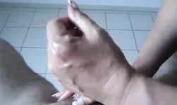 Very good amateur handjob provided by a horny girlfriend