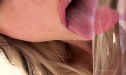 Ron Harris blonde is sucking her favorite transparent dildo