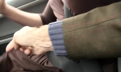 Awesome babe in black stockings is walking on the street and flashing her panties