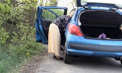 Amateur MILF in black stockings demonstrates her hot body outdoors