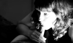 Astonishing amateur cutie gives a deep blowjob in black & white style