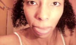 Sexy as hell ebony nicely shows off her very long tongue