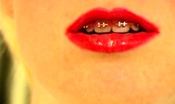 Perfect blonde with innocent face reveals her cute long tongue