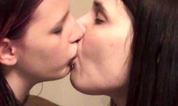 Stunning lesbian kisses of two amateur babes with long tongues