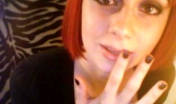 Redhead hottie with smoky eyes and long tongue does love fetish