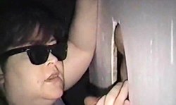 Fatty amateur mature performs a blowjob in her first gloryhole