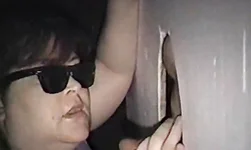 Fatty amateur mature performs a blowjob in her first gloryhole
