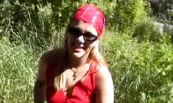 Shameless teen in sunglasses is sucking a massive boner outdoors