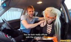 Slutty blonde gives a blowjob in Fake Driving School