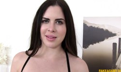 Lovely brunette Cassie Fire slowly undresses on the casting