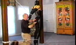 Babe in corset is being undressed and roped with force