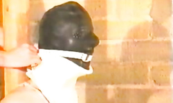 Ultra-slender redhead is standing in a hot latex suite