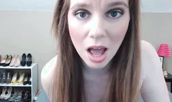 Perfect blue eyed redhead with big natural breast