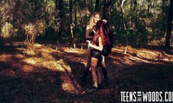 Sweet redhead teen undresses in the forest just to show her tits