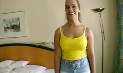 Blonde milf showing off her huge boobs