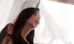 Goddess with ideal body posing in a hot black lingerie