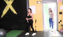 Money Talks amazing babes Charlie Fletcher and Esmi Leen pose topless in the gym