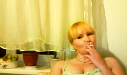 Curvy blonde milf reveals her massive natural melons