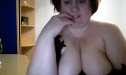 Hot chubby Russian mature shows off her massive naked boobs