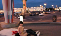 Amateur brunette is posing fully naked in a public place