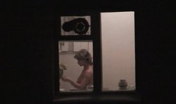 Spying on a hot Russian MILF and filming her amazing naked tits