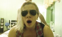 Sweet Russian hottie in sunglasses looks amazing in this pose