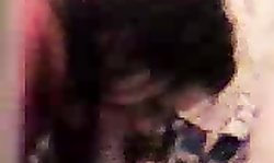 Good-looking Russian brunette is sucking a huge boner in the bedroom