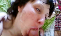 Sweet brunette is wanking his hard dick in her mouth