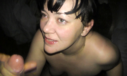 Dark-haired young chick is wanking his cock only to get some jizz