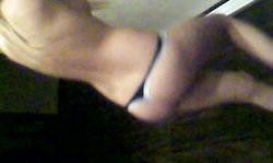 Topless Russian girlfriend in black panties shows her beautiful body