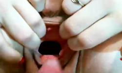 Awesome chick is stretching her snatch in front a hard dick