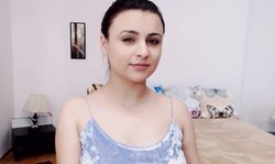 Sweet Brunette Beauty Shows Supple Breasts