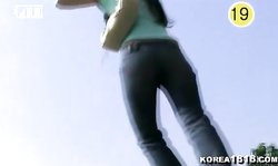 Lovely Korean brunette with natural tits rides a cock in the car