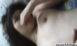 Angelic Korean stimulates her little wet snatch with a blue toy