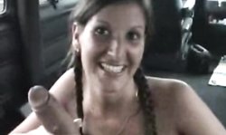 Pigtailed young brunette Marie gives a very sensual blowjob