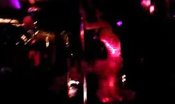 Slender stripper is dancing on shaft and playing with her body
