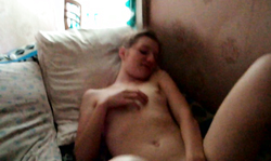 Smiling Russian teen is accurately rubbing her shaved pussy