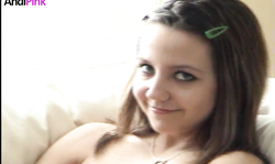 Dark-haired cutie Andi Pink shows off her natural boobies