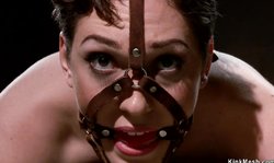 Bound slave holding heavy buckets