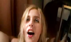 Skillful young girlfriend with innocent eyes is blowing a boner