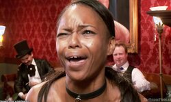 Ebony and blonde licking at bdsm party