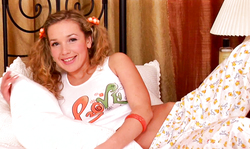 Pigtailed teen with cute face fucks her snatch with a dildo