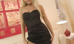 Strict blonde with round booty and hot look takes off her black satin dress